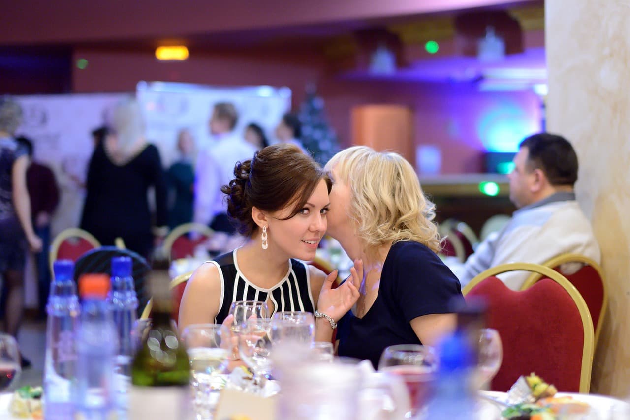 Coworkers celebrating together at a company holiday party outing